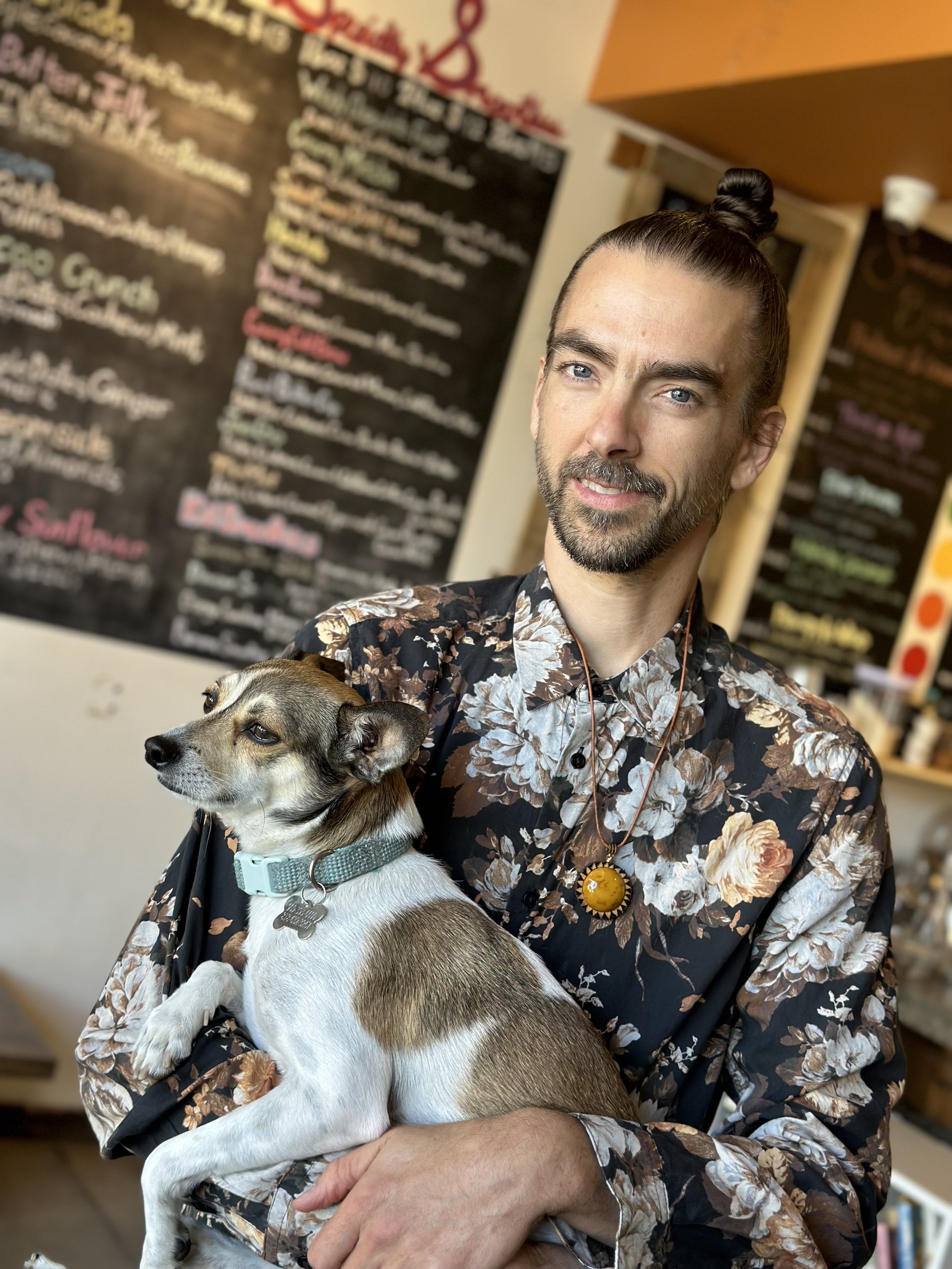 Ninja Nicky with dog at Auraganic Juicery